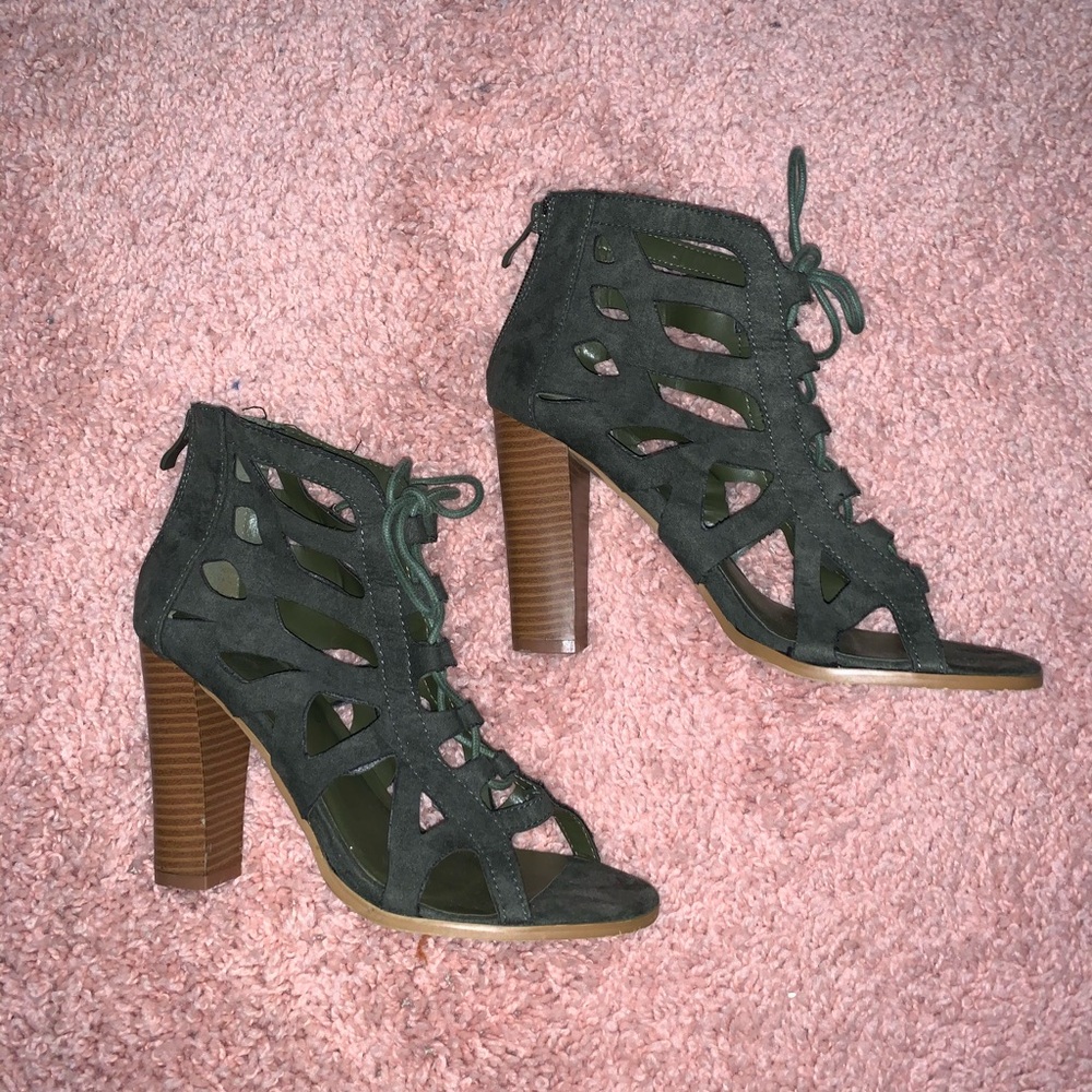 Green lace up/ zip up heels.